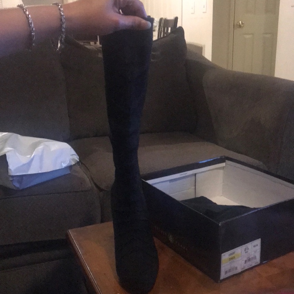 Black ridged long boots